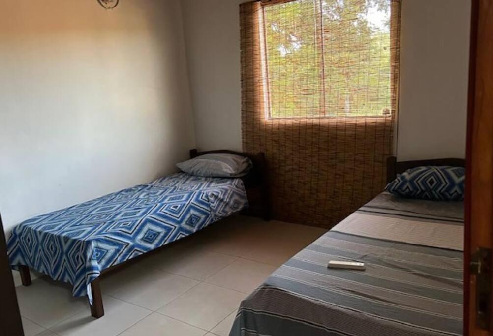 Postel nebo postele na pokoji v ubytování Duplex Aeropuerto c/cochera cerrada