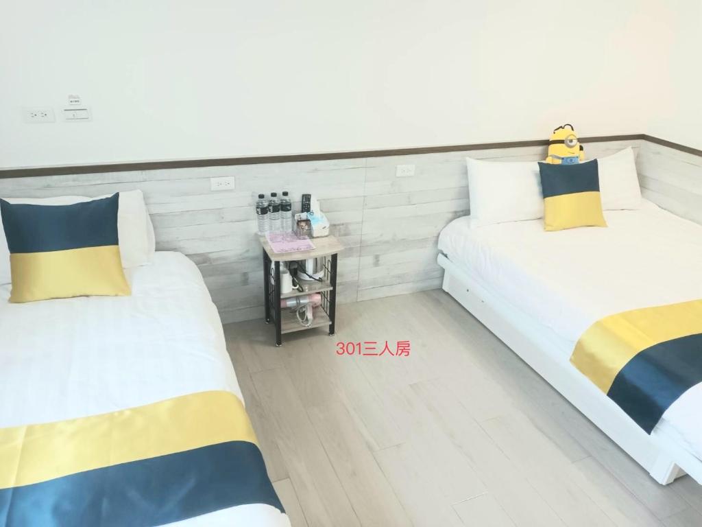 Postel nebo postele na pokoji v ubytování Xiaomi Courtyard B&B