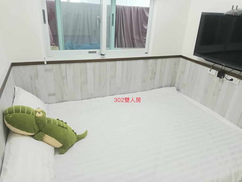 Postel nebo postele na pokoji v ubytování Xiaomi Courtyard B&B
