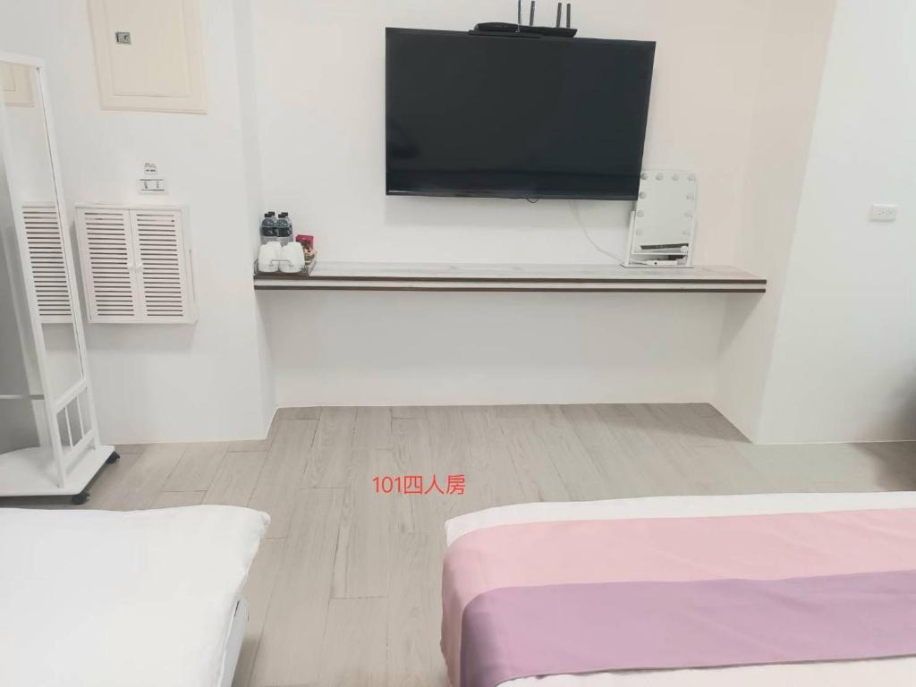 TV a/nebo společenská místnost v ubytování Xiaomi Courtyard B&B