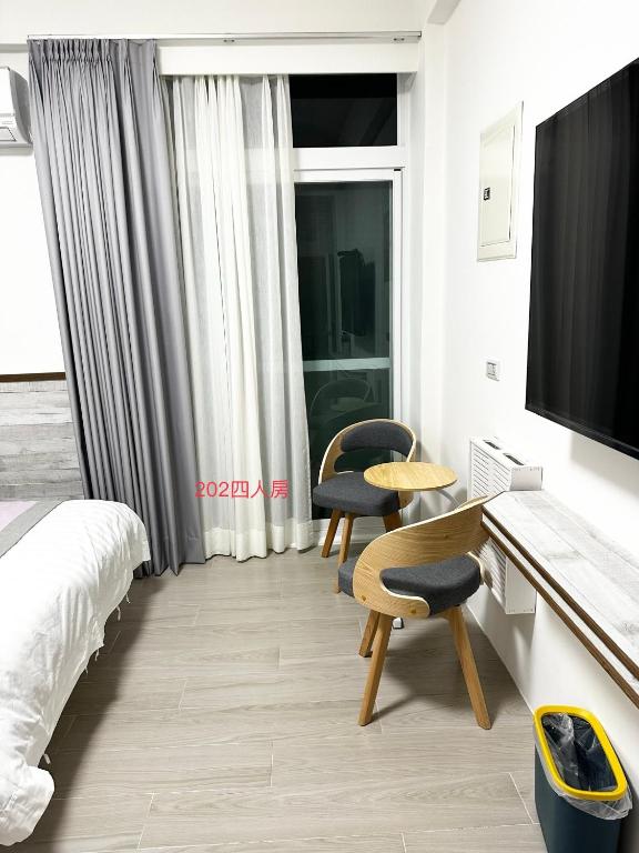 Postel nebo postele na pokoji v ubytování Xiaomi Courtyard B&B