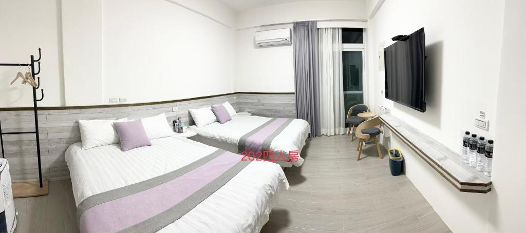 Postel nebo postele na pokoji v ubytování Xiaomi Courtyard B&B