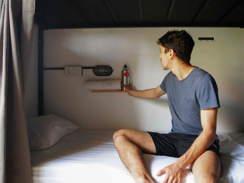 Postel nebo postele na pokoji v ubytování Sepeda Hostel
