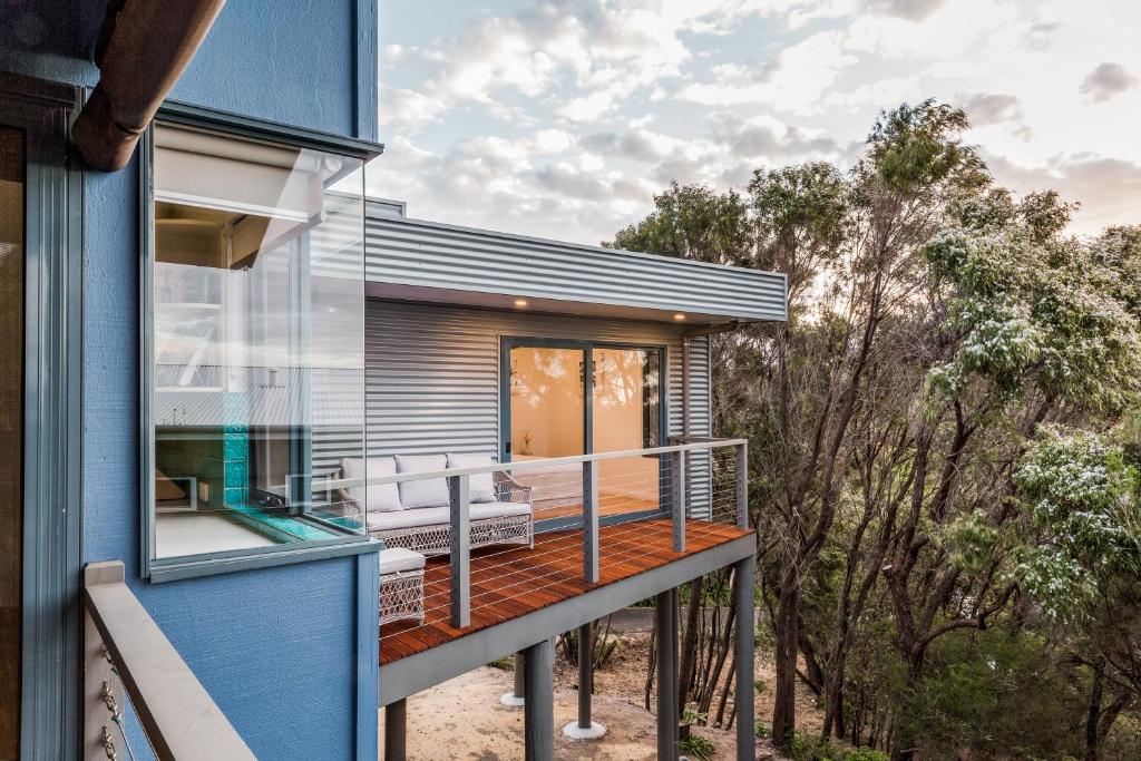 a house with a wrap around deck with a view at Ocean Blue - Gnarabup NEW in Gnarabup