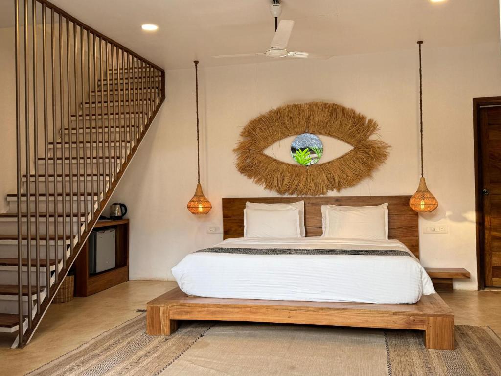 Кровать или кровати в номере Thalassa Beach Boutique Resort