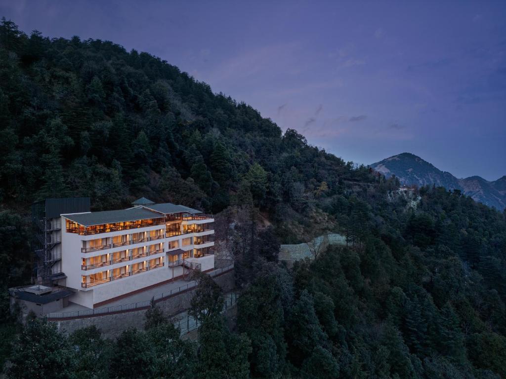 a building on the side of a mountain at jüSTa Hollow Oak, Mussoorie in Mussoorie
