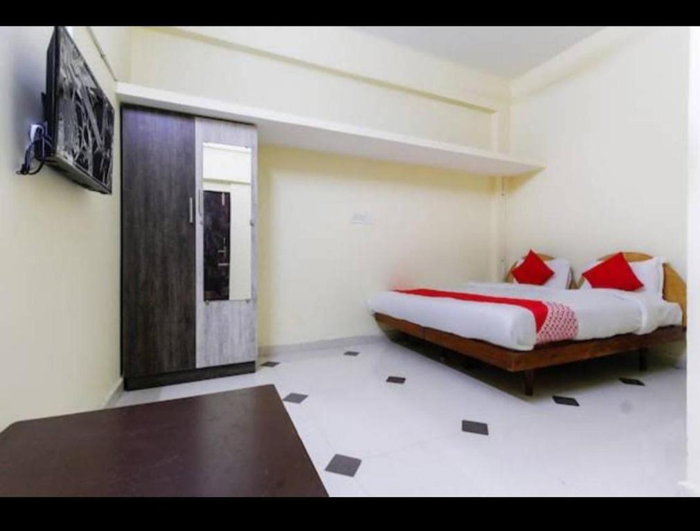 Postel nebo postele na pokoji v ubytování SK Residency