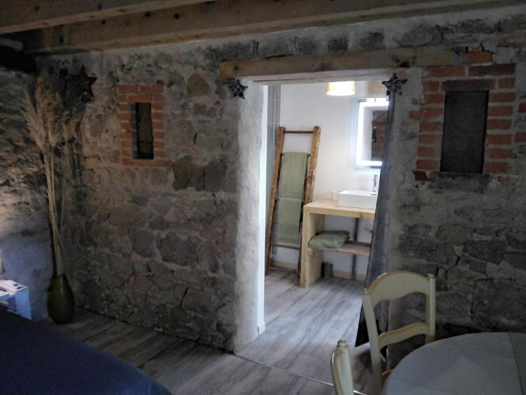 Postel nebo postele na pokoji v ubytování Chambres d'hôtes Les cabris