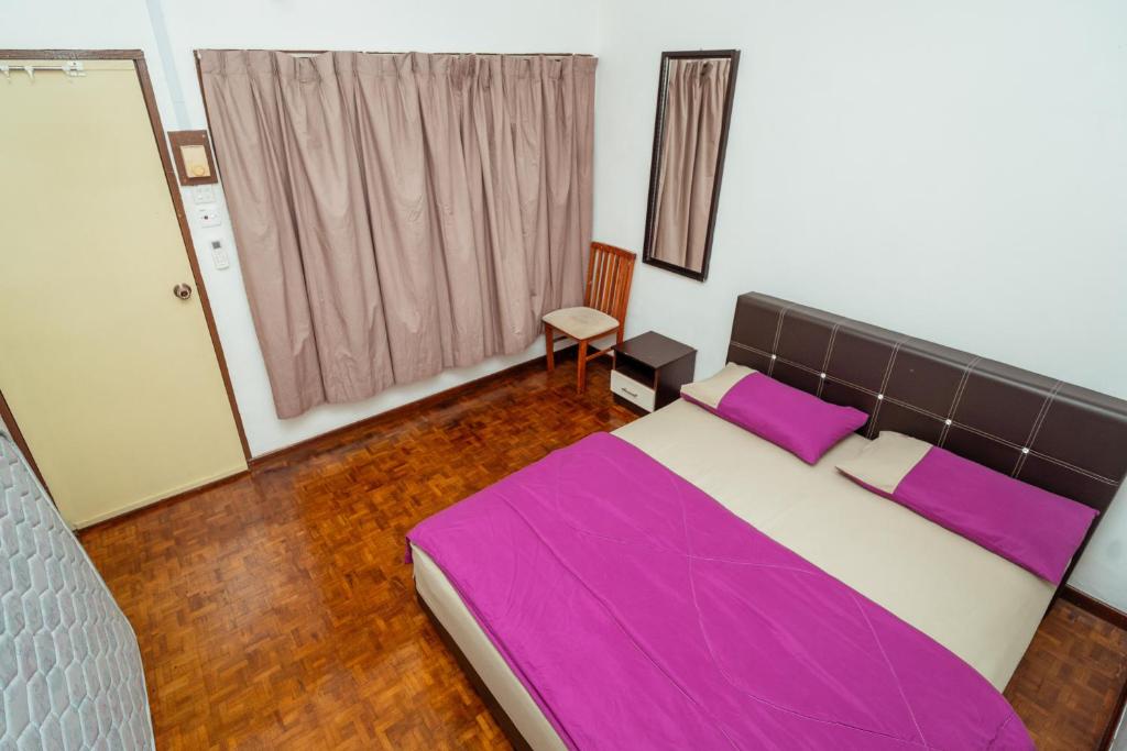 Postel nebo postele na pokoji v ubytování GLYSM Tambun Stay "Pura Vida"