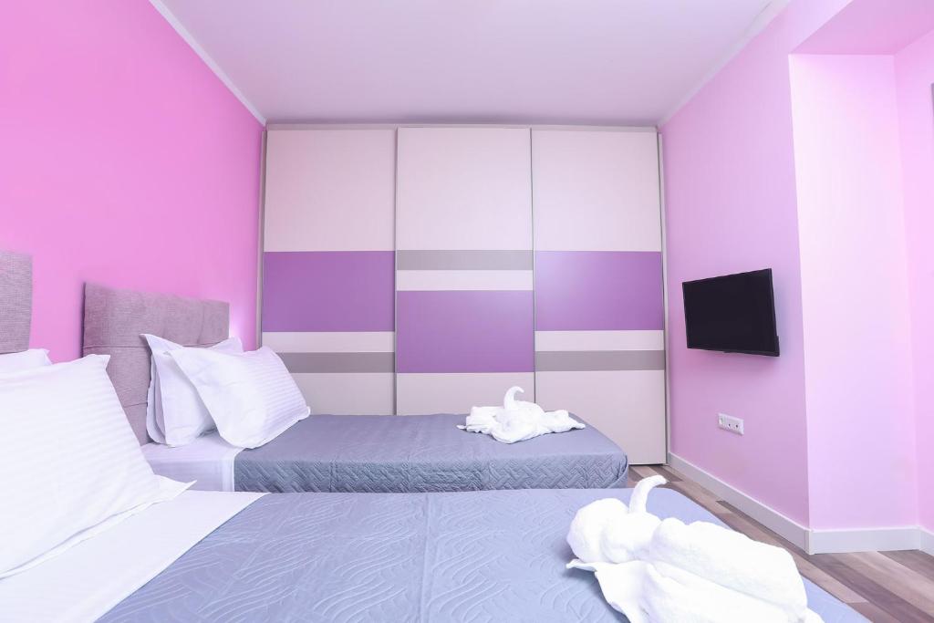 Postel nebo postele na pokoji v ubytování Ulivi Verdi Villa