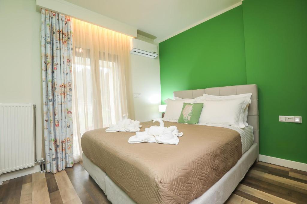 Postel nebo postele na pokoji v ubytování Ulivi Verdi Villa