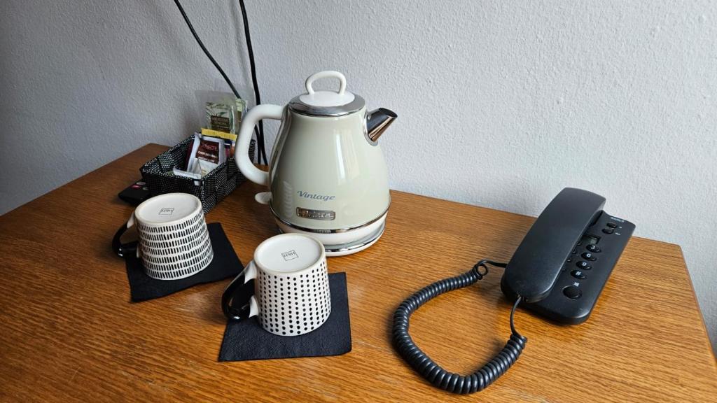 Příslušenství pro přípravu čaje a kávy v ubytování Hotel Montecodeno