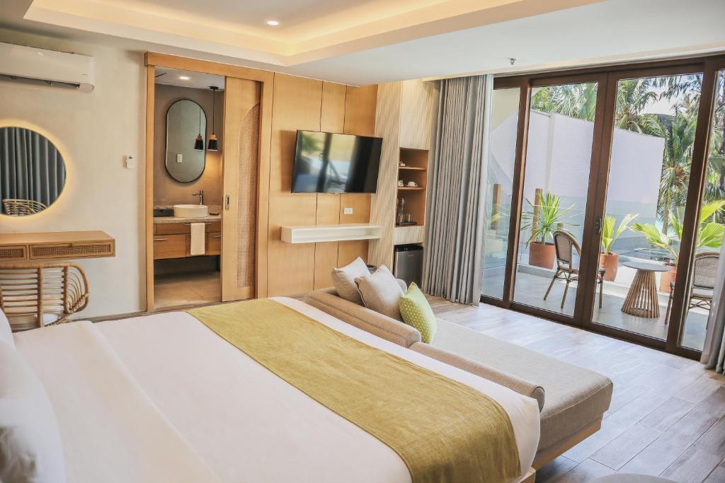Postel nebo postele na pokoji v ubytování Mandarin Nest Boracay