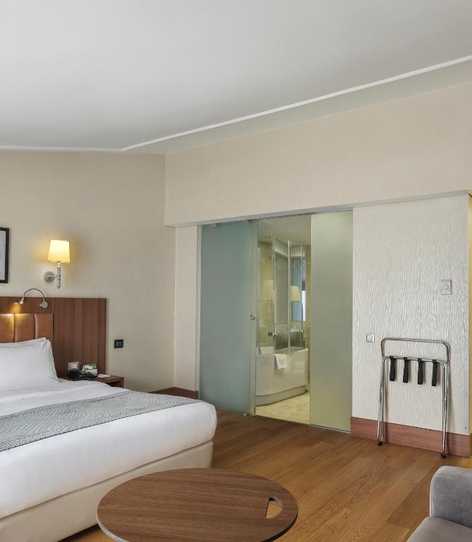 a hotel room with a bed and a bathroom at Holiday Inn Istanbul Old City by IHG in Istanbul
