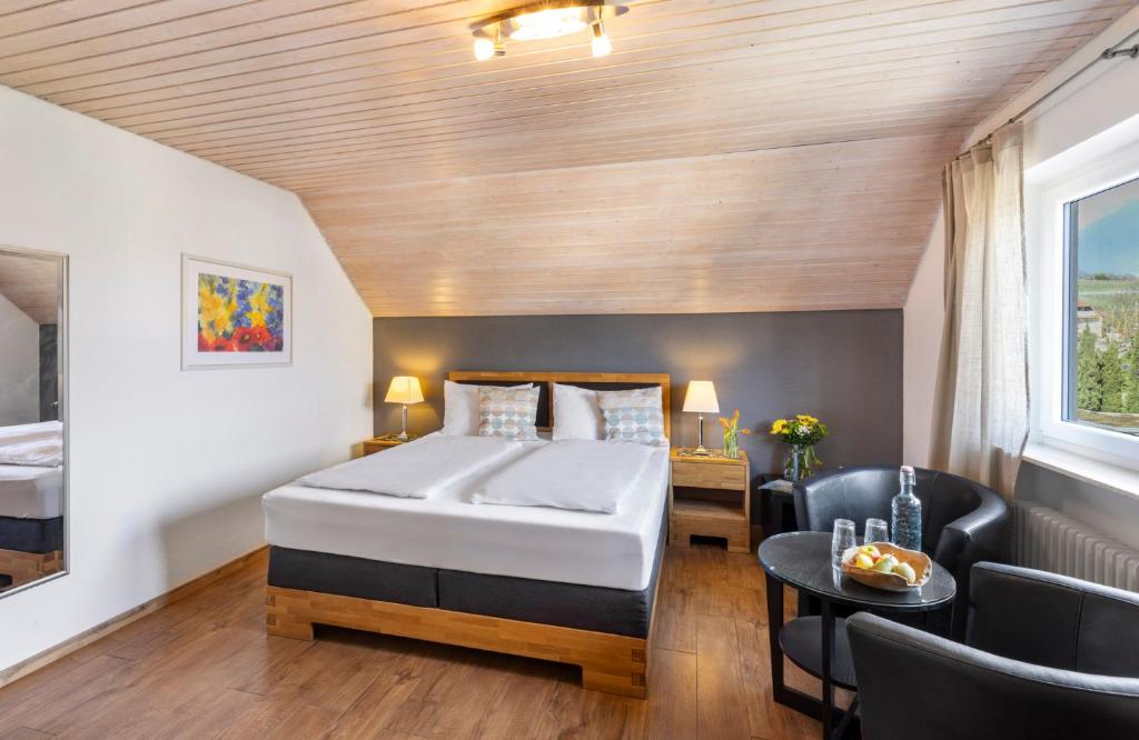 Postel nebo postele na pokoji v ubytování Hotel Garni Sonnengruss