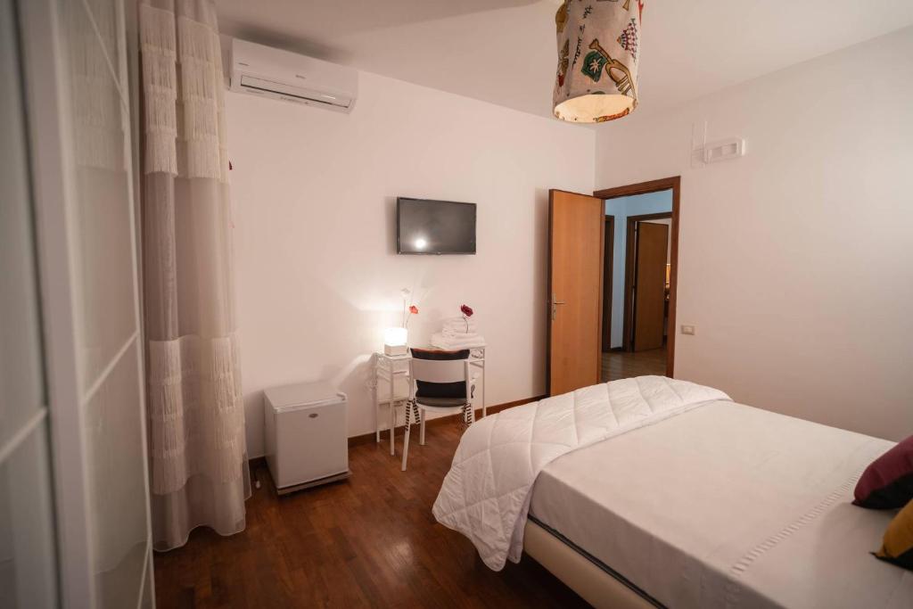 Postel nebo postele na pokoji v ubytování B&B CASA GAGLIARDI