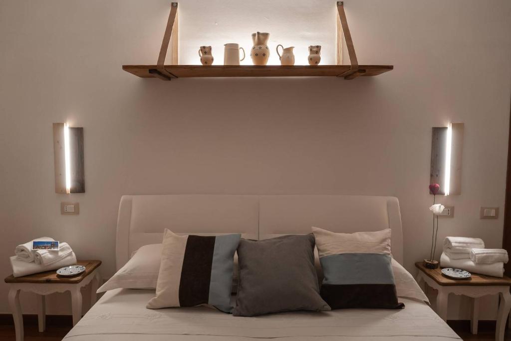 Postel nebo postele na pokoji v ubytování B&B CASA GAGLIARDI