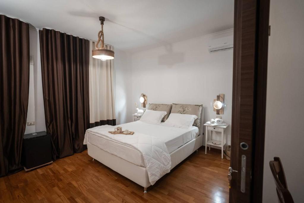 Postel nebo postele na pokoji v ubytování B&B CASA GAGLIARDI