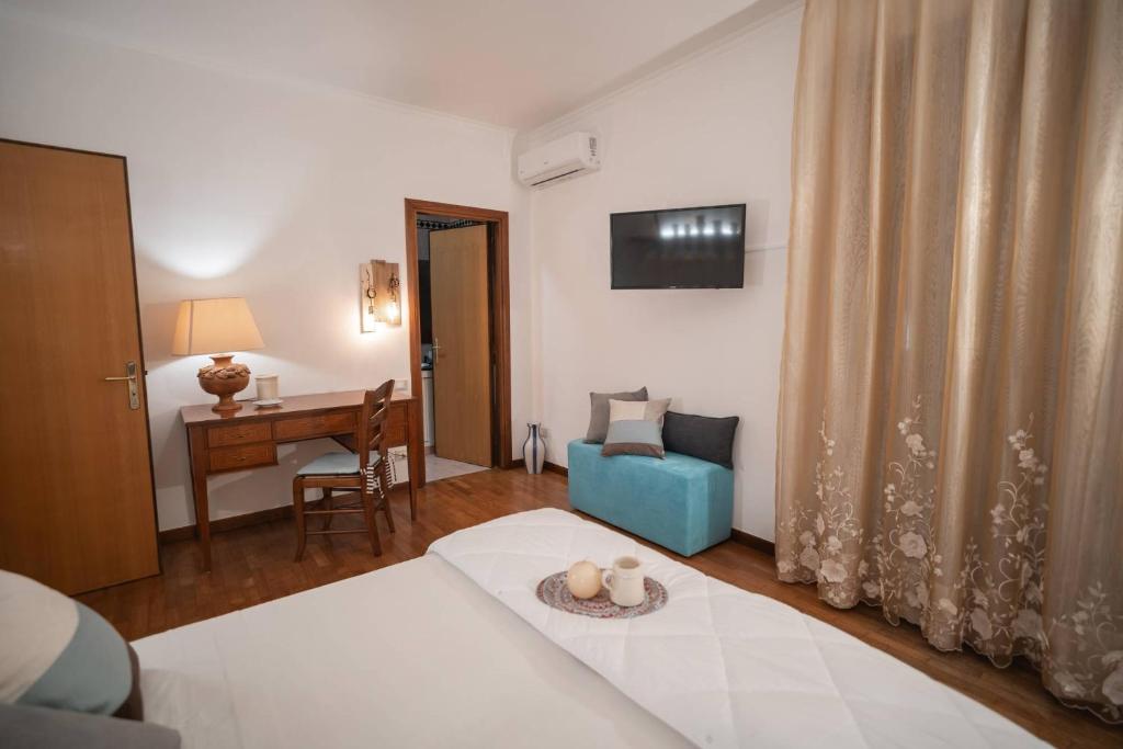 Postel nebo postele na pokoji v ubytování B&B CASA GAGLIARDI