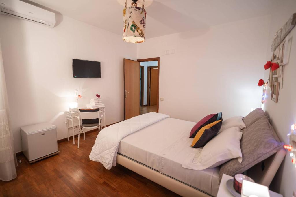 Postel nebo postele na pokoji v ubytování B&B CASA GAGLIARDI