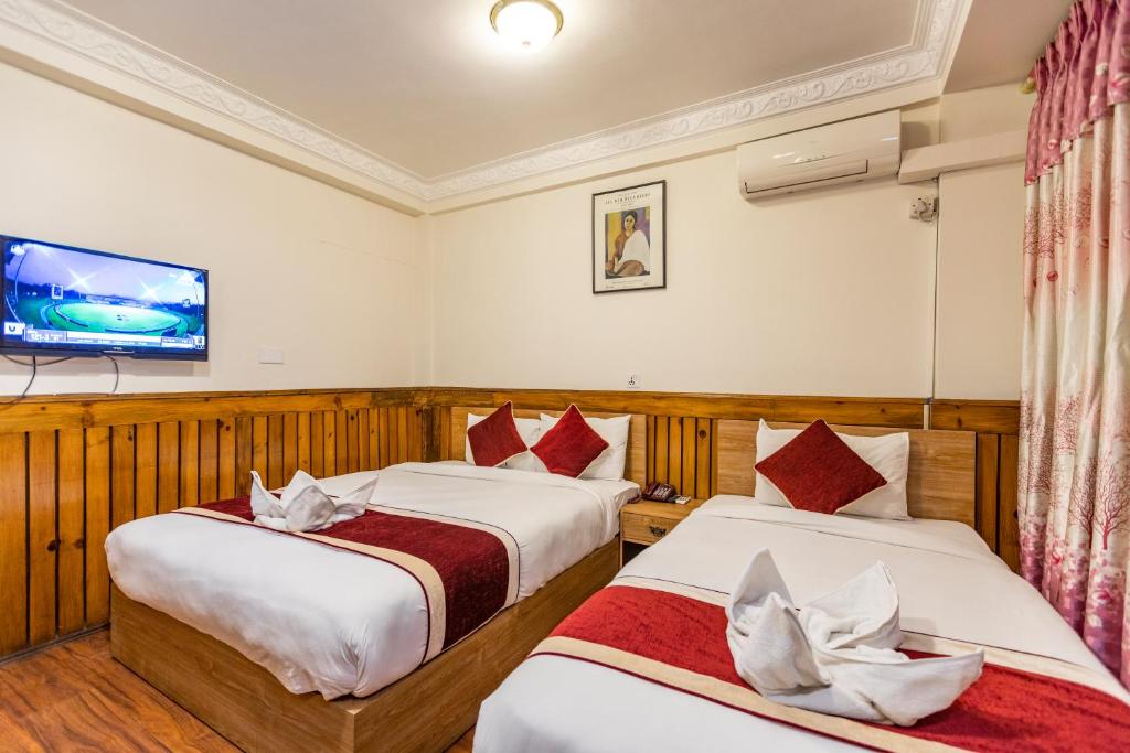 Postel nebo postele na pokoji v ubytování Hotel Sekai
