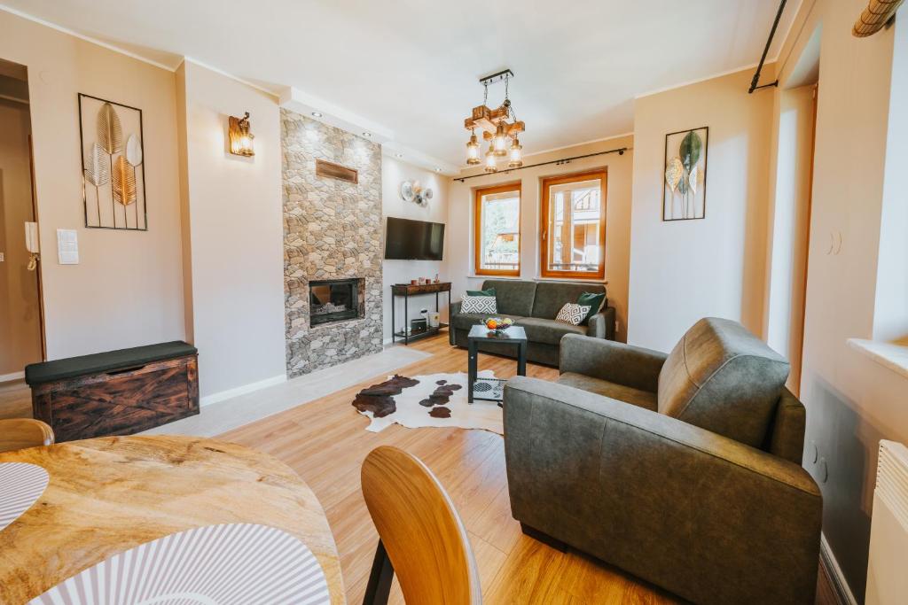 TV a/nebo společenská místnost v ubytování VisitZakopane - Ibiza Apartment