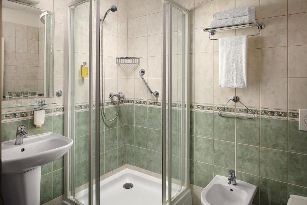 Koupelna v ubytování Alqush Downtown Hotel