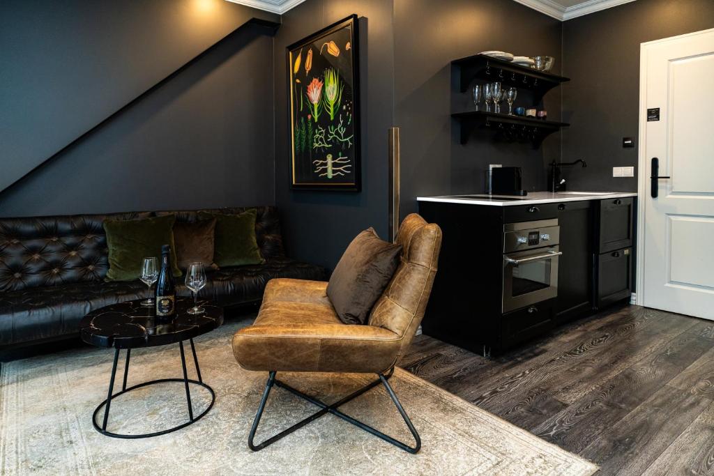 Kuchyň nebo kuchyňský kout v ubytování Vintage Apartment Hotel