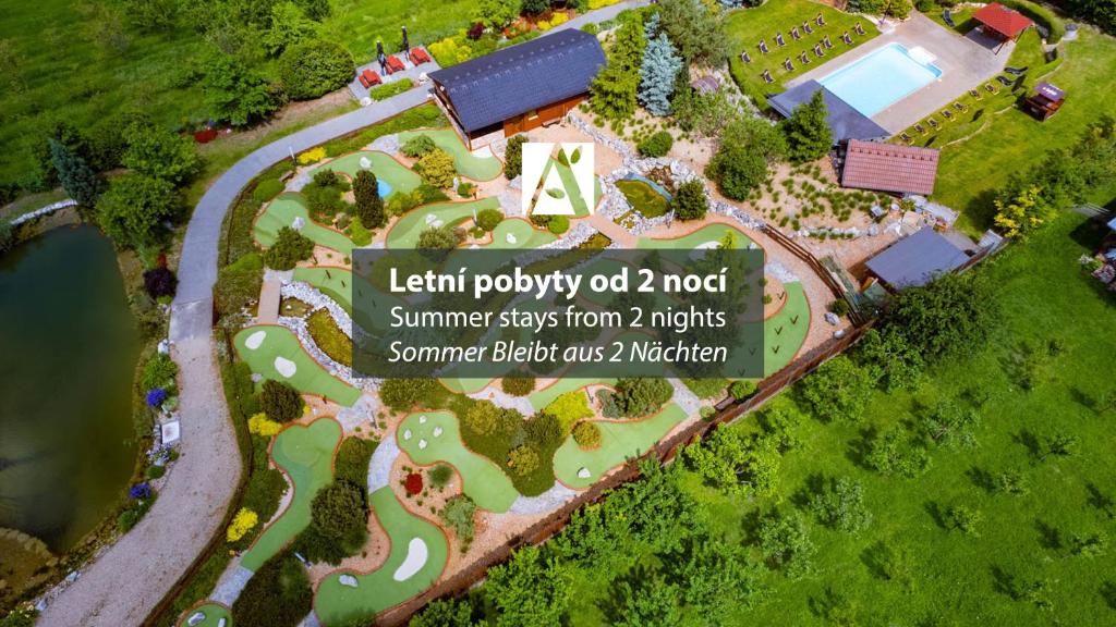 a model of a park with a yard and a sign at Amenity Penzion Horni Vestonice in Horní Věstonice
