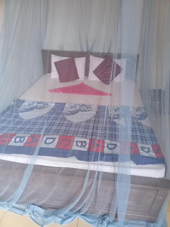 Postel nebo postele na pokoji v ubytování Dreamscape home stay