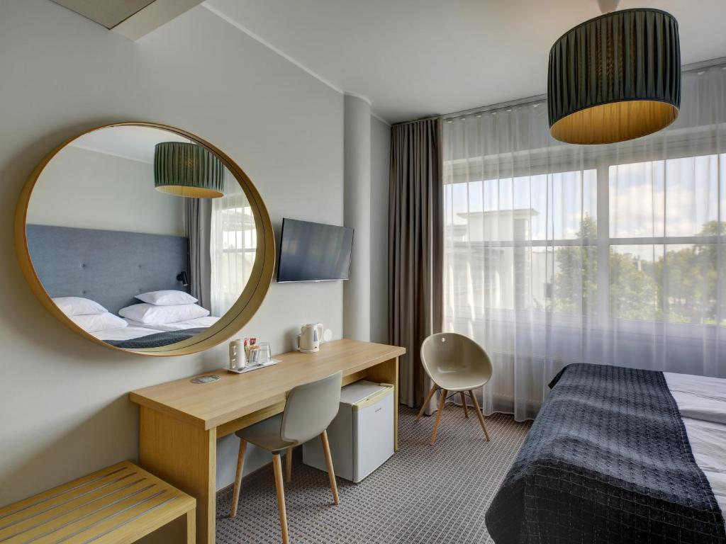Uma cama ou camas num quarto em Estonia Resort Hotel & Spa