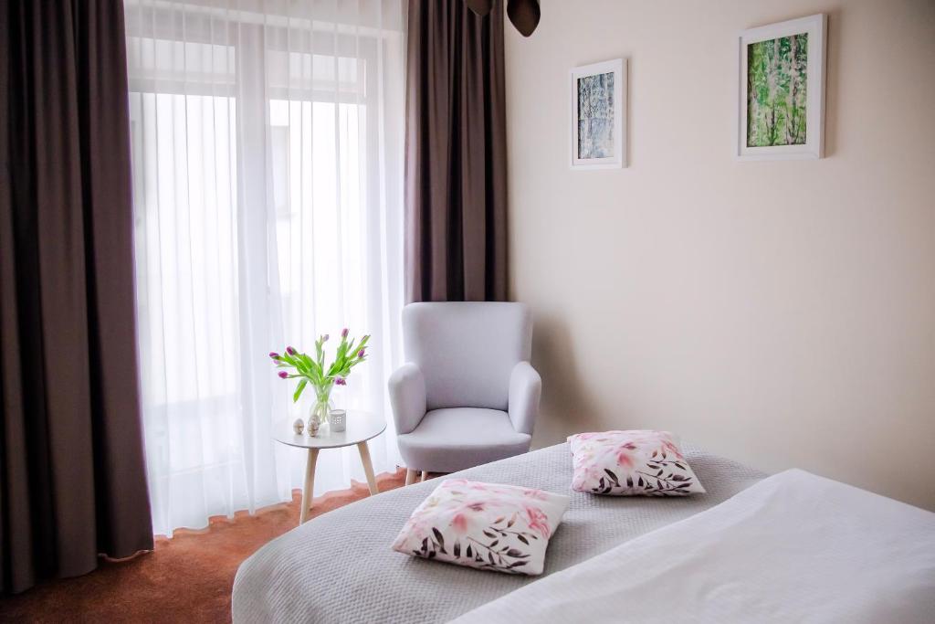 Postel nebo postele na pokoji v ubytování Apartament Bimba & Free Parking