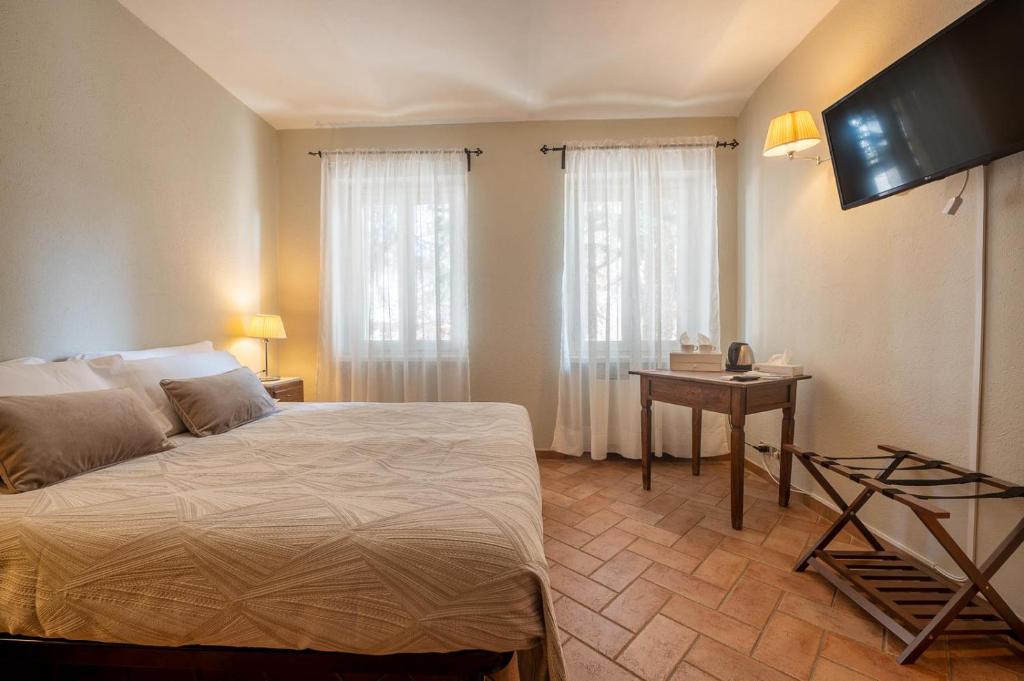 Postel nebo postele na pokoji v ubytování CONVINO