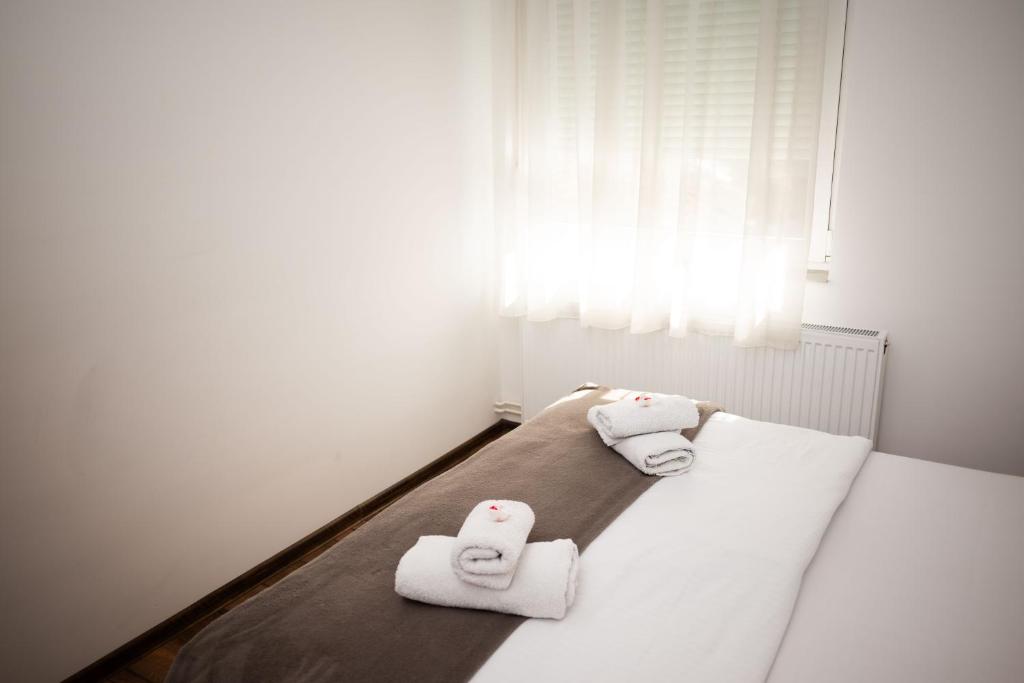Postel nebo postele na pokoji v ubytování Apartment Primula