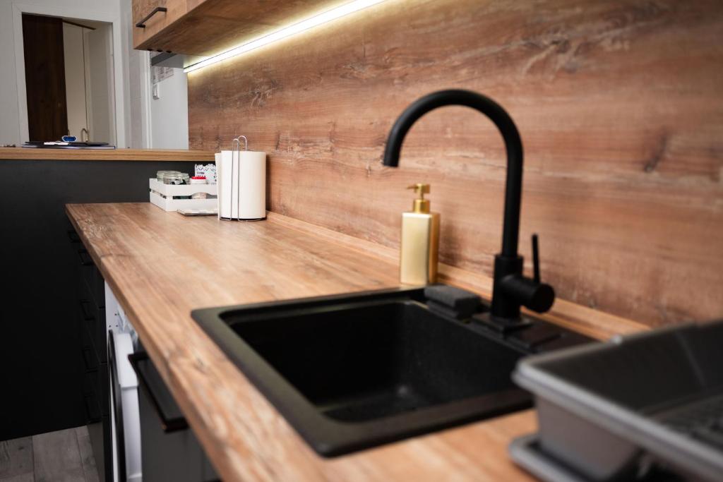 Kuchyň nebo kuchyňský kout v ubytování Apartment Primula