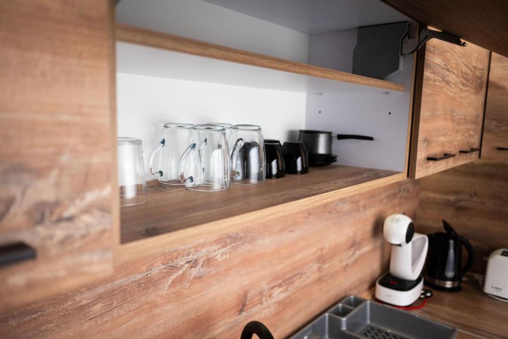 Kuchyň nebo kuchyňský kout v ubytování Apartment Primula