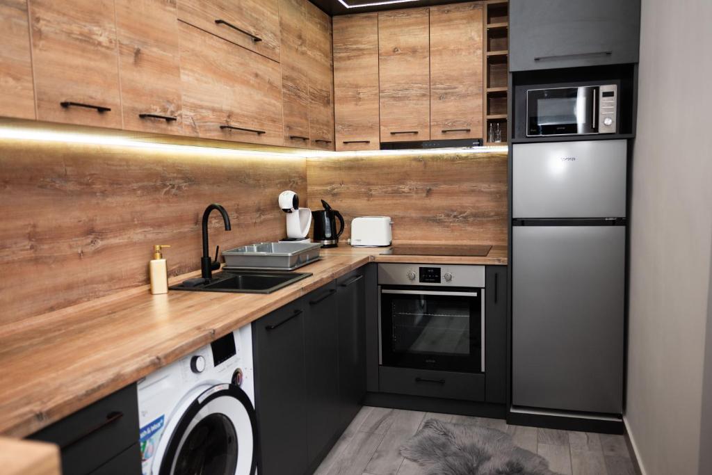 Kuchyň nebo kuchyňský kout v ubytování Apartment Primula