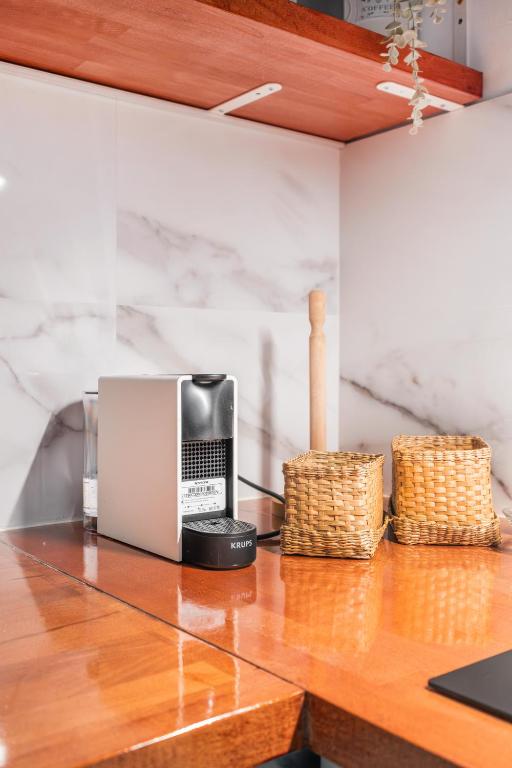 Kuchyňa alebo kuchynka v ubytovaní Touch My Heart Malaga City center apartment BY NAMASTE ELITE