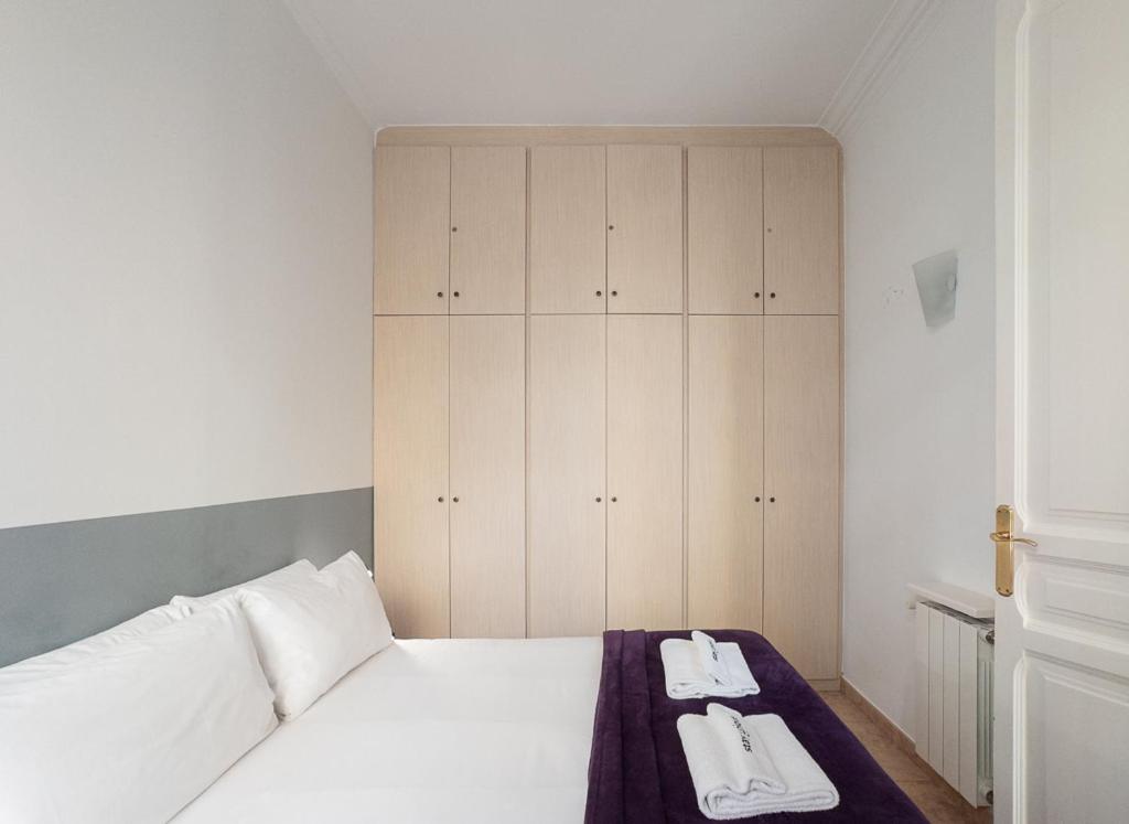 Postel nebo postele na pokoji v ubytování Stay U-nique Apartments Sagrada Familia II