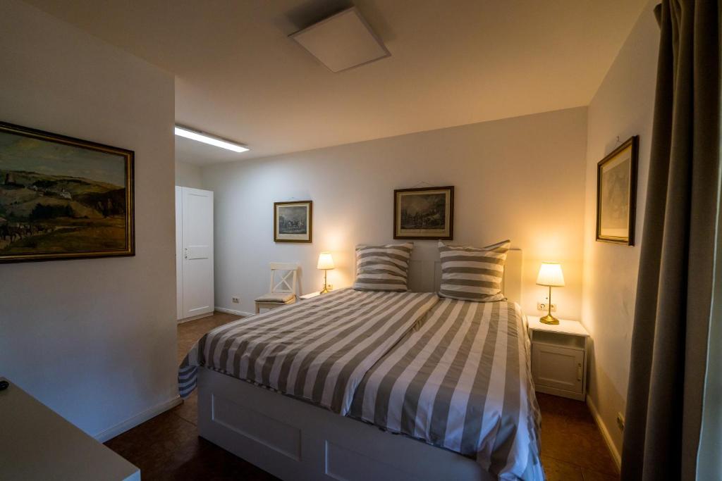 Postel nebo postele na pokoji v ubytování Burg Satzvey