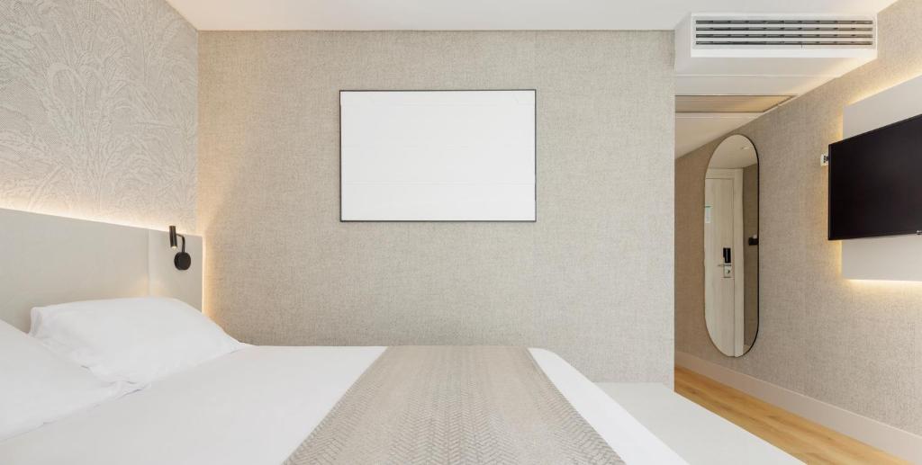 Postel nebo postele na pokoji v ubytování Hotel Ilunion San Sebastián