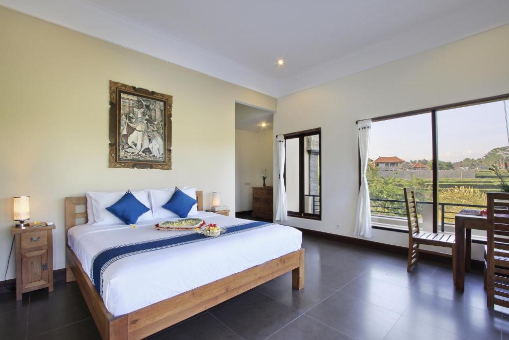 Postel nebo postele na pokoji v ubytování Nang Ade Villa by Pramana Villas