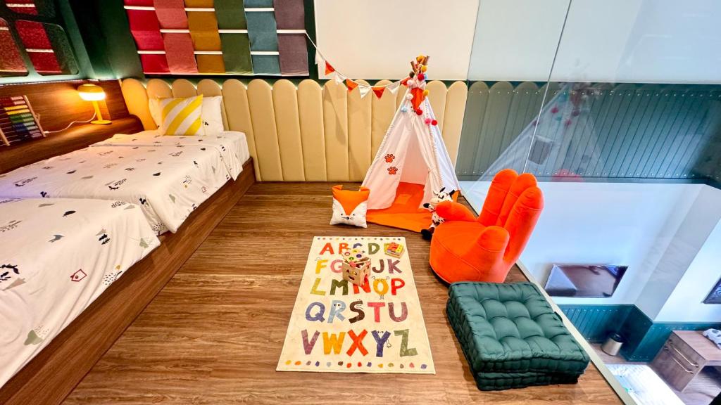Postel nebo postele na pokoji v ubytování Ashley Tugu Tani Menteng