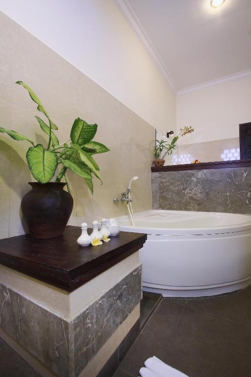 Koupelna v ubytování Nang Ade Villa by Pramana Villas