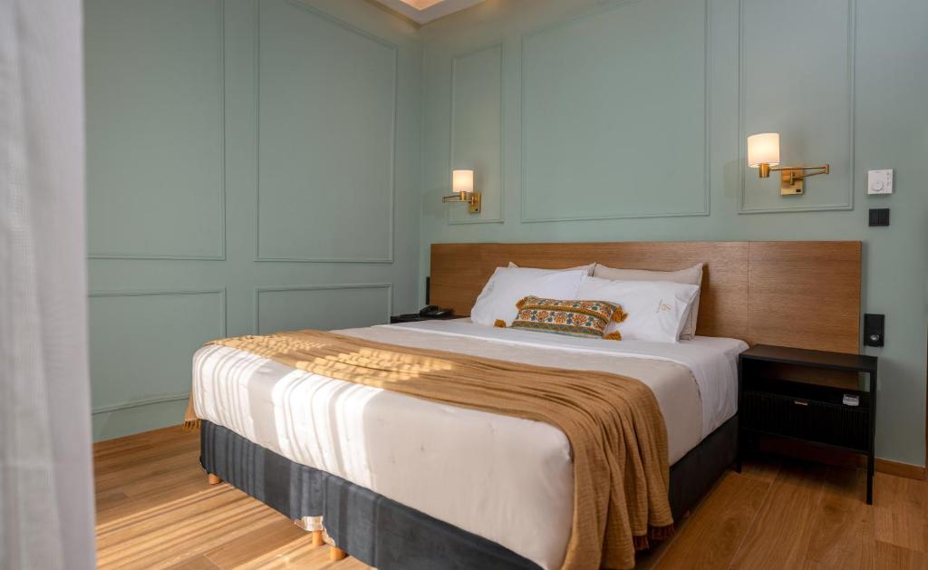 Posteľ alebo postele v izbe v ubytovaní Aggelos Hotel
