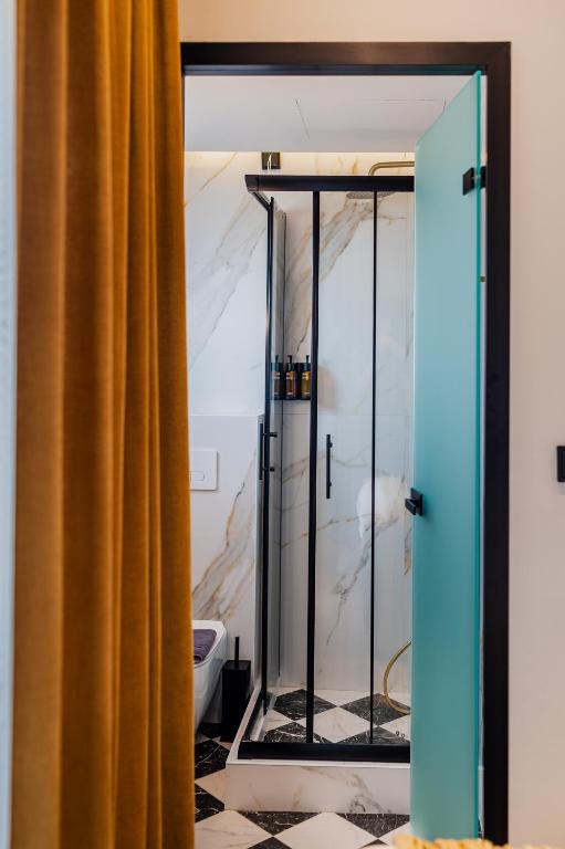 Kúpeľňa v ubytovaní Aggelos Hotel