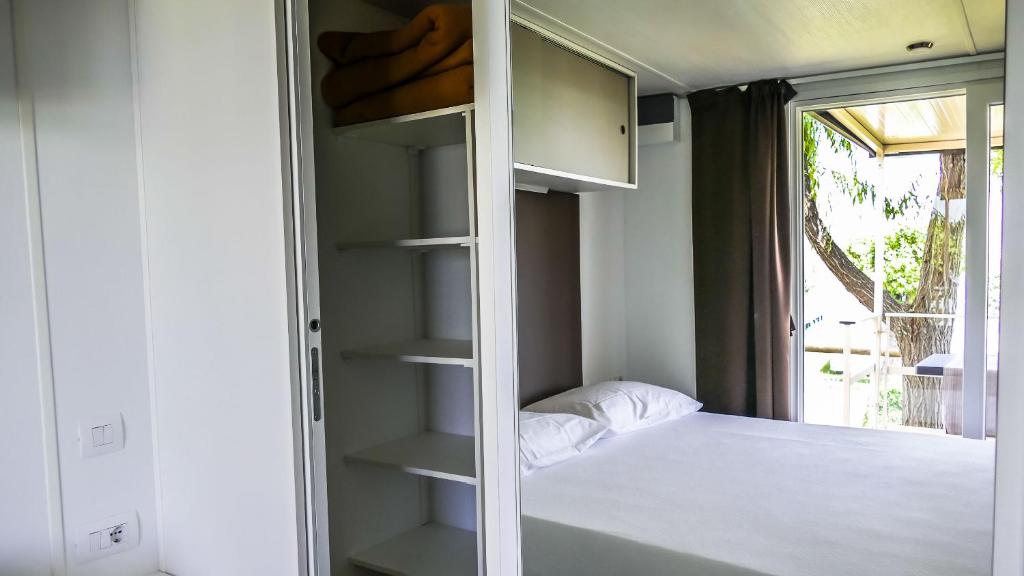 Postel nebo postele na pokoji v ubytování Camping Lido