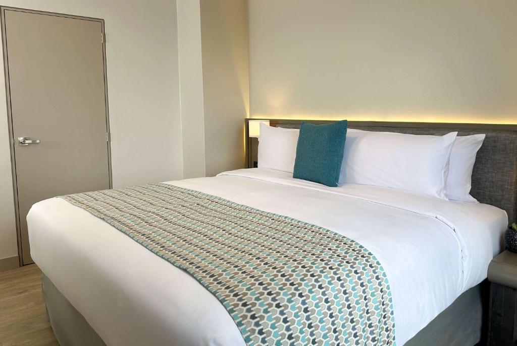 Postel nebo postele na pokoji v ubytování La Quinta by Wyndham Quito