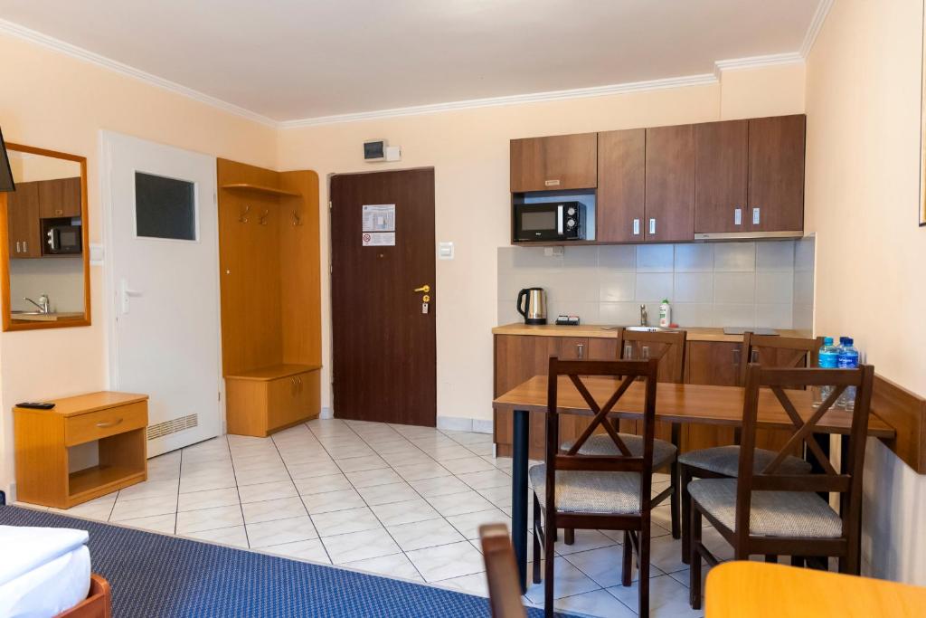 Kuchyňa alebo kuchynka v ubytovaní Hit Apartments