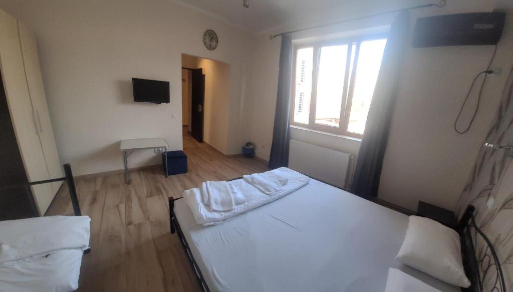 Postel nebo postele na pokoji v ubytování Byzanthin Hostel